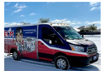 An E+M Emergency Air Conditioning branded van serving a Central Texas neighborhood